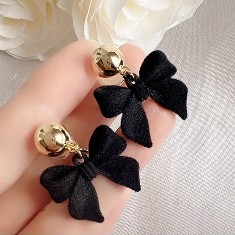 Chic Black Bow Earrings with Gold Accents